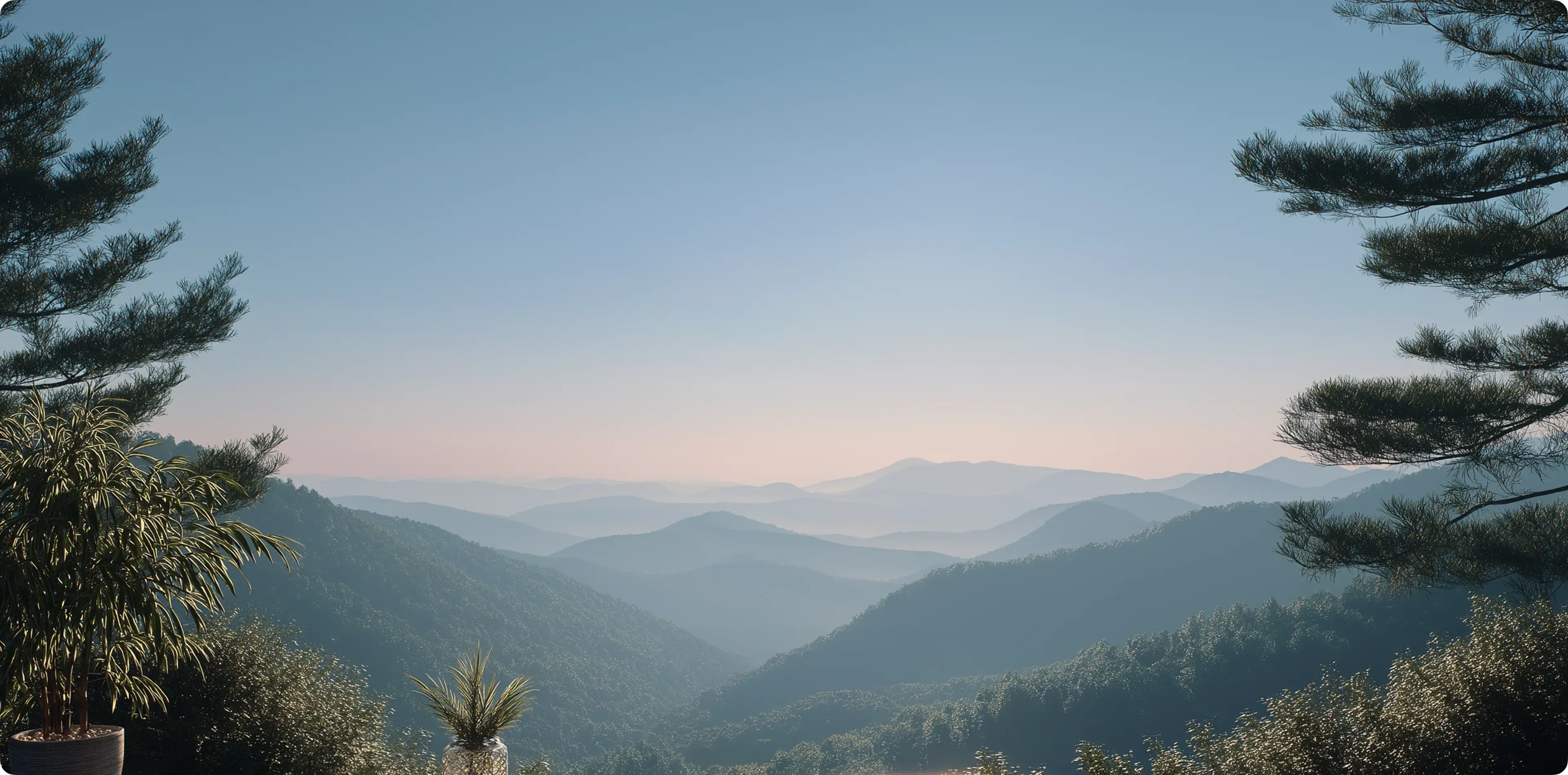 Sunrise over rolling mountain ranges
